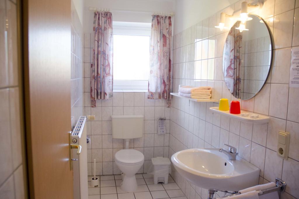 Hotel Zum Wikinger Neßmersiel Pokoj fotografie