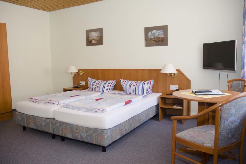 Hotel Zum Wikinger Neßmersiel Pokoj fotografie