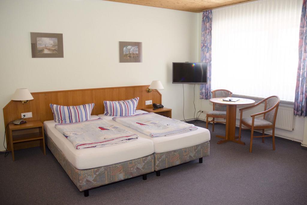 Hotel Zum Wikinger Neßmersiel Pokoj fotografie