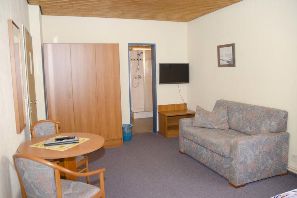 Hotel Zum Wikinger Neßmersiel Pokoj fotografie