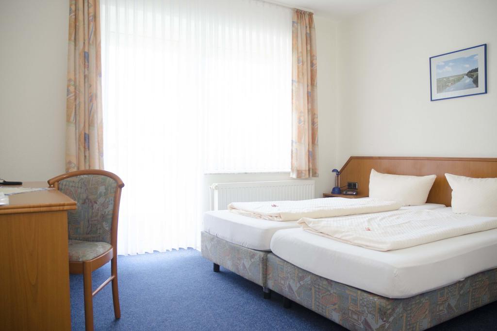 Hotel Zum Wikinger Neßmersiel Pokoj fotografie